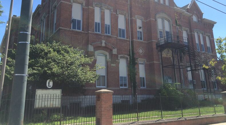 Dayton’s 137-year-old Longfellow Academy, at 245 Salem Ave., will be closed in 2017-18. JEREMY P. KELLEY / STAFF