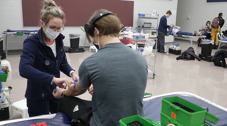 Students and staff at Springfield High School held a blood drive for the Community Blood Center last year. BILL LACKEY/STAFF