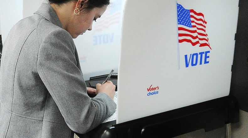 Maddie Logan votes Friday, July 28, 2023 at the Miami County board of elections office in Troy. MARSHALL GORBY\STAFF