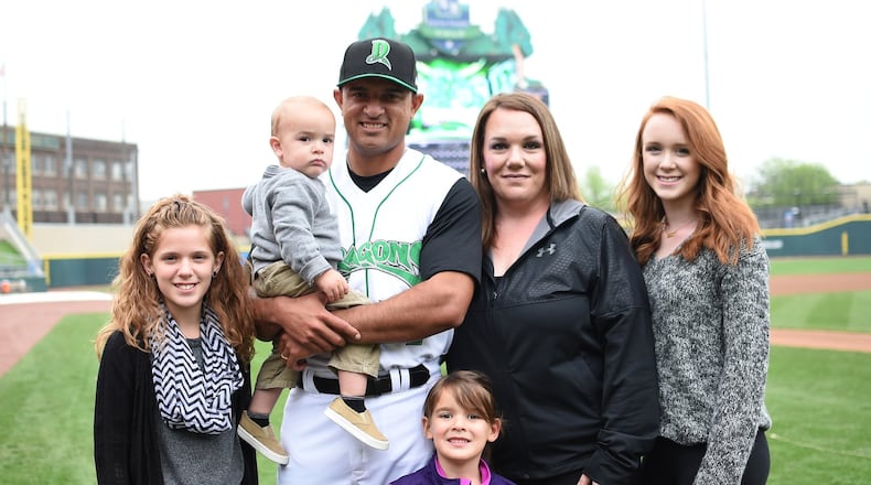 Dragons first-base coach Luis Bolivar and his family: Zoey (front). Second row: Daughter Luisa, Luis holding son Enzo, wife Kelly and daughter Kamryn. CONTRIBUTED PHOTO / Nicholas Studios