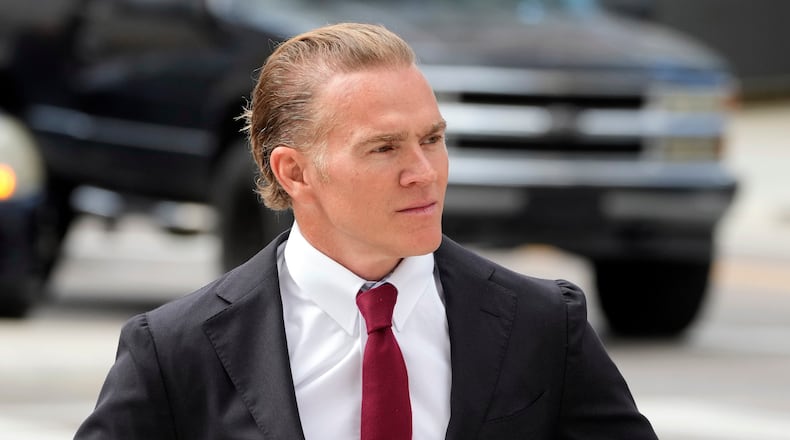 Former Green Beret Jordan Goudreau walks to the United States Courthouse for a bond hearing in Tampa, Fla., Wednesday, Oct. 29, 2025. (AP Photo/Chris O'Meara)