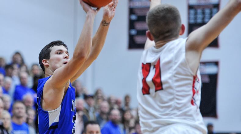 Brookville’s Wade Turner puts up a shot defended by Franklin’s Will Emrick during their basketball game Friday, Feb. 8, 2019 at Franklin High School. NICK GRAHAM/STAFF