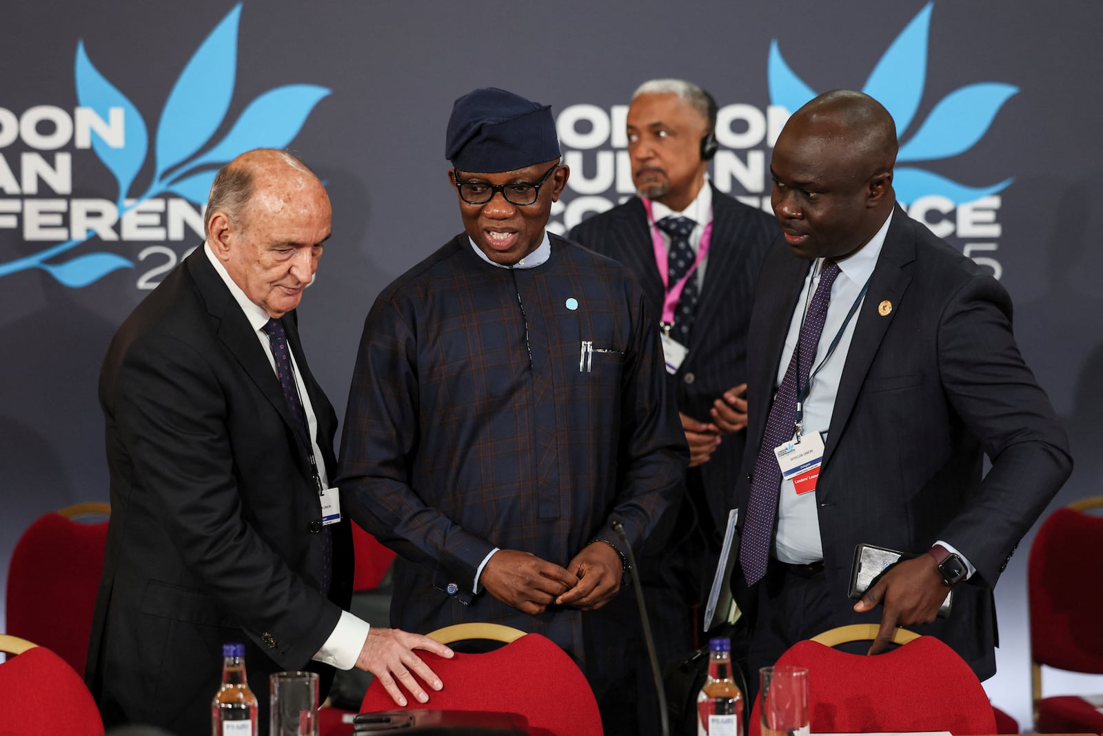Bankole Adeoye, Political Affairs, Peace and Security Commissioner for the African Union, center, attends the London Sudan conference at Lancaster House in London, Tuesday, April 15, 2025. (Isabel Infantes/Pool Photo via AP)