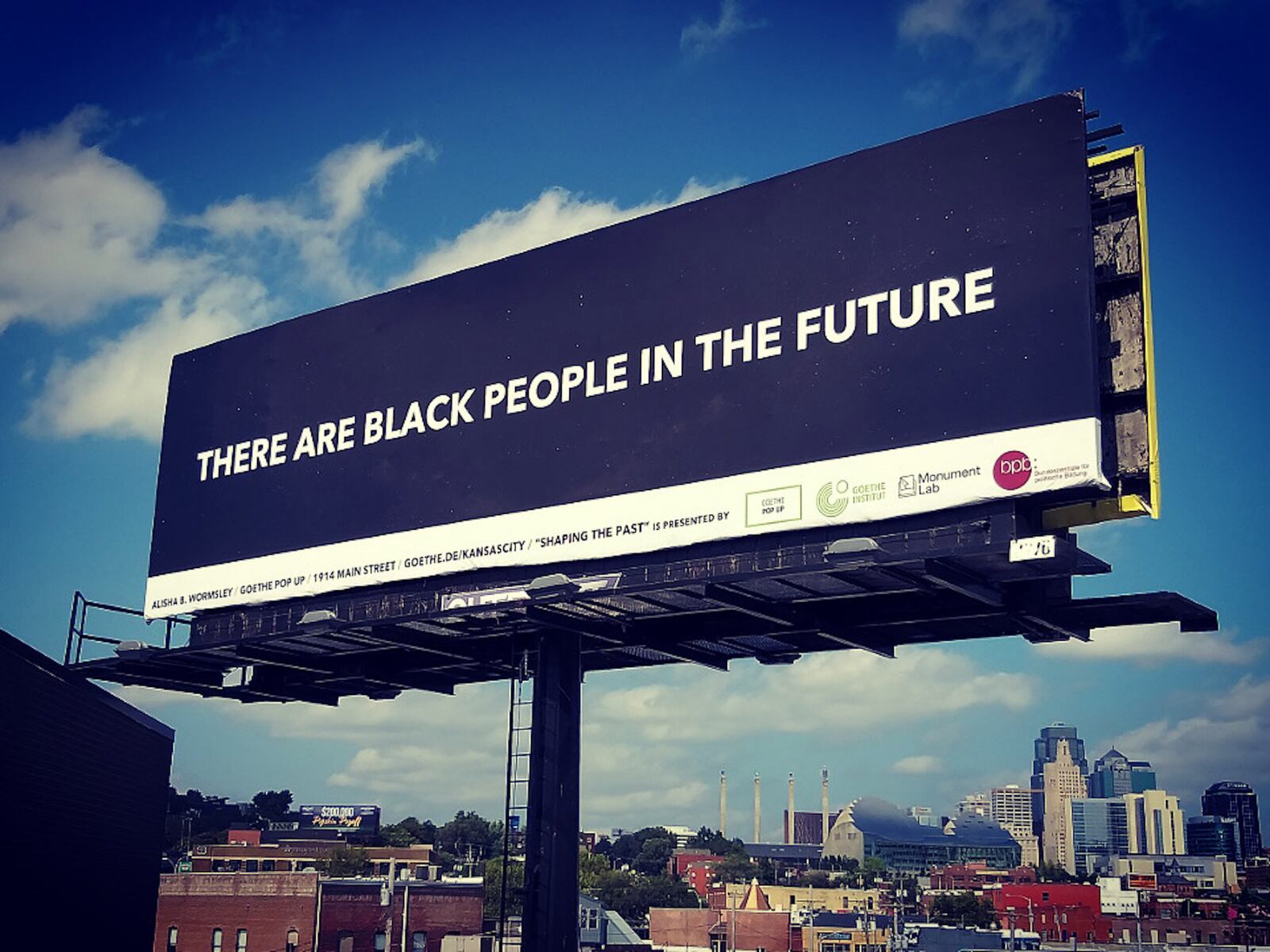 ‘There are Black People in the Future,’ is a project that addresses systemic oppression of Black communities through space and time by reassuring the presence of Black bodies. In 2017, Wormsley placed these words on a billboard in East Liberty, a neighborhood in Pittsburgh’s east end that has suffered gentrification. (Alissa B. Wormsley)