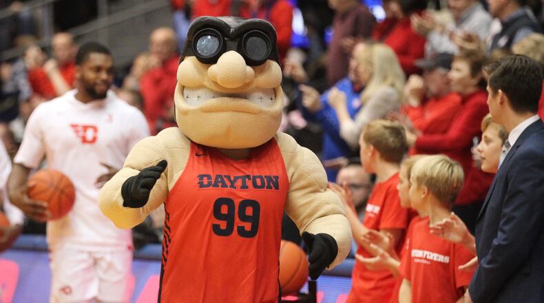 Rudy Flyer leads Dayton onto the court before a game against Purdue Fort Wayne on Nov. 16, 2018, at UD Arena. David Jablonski/Staff