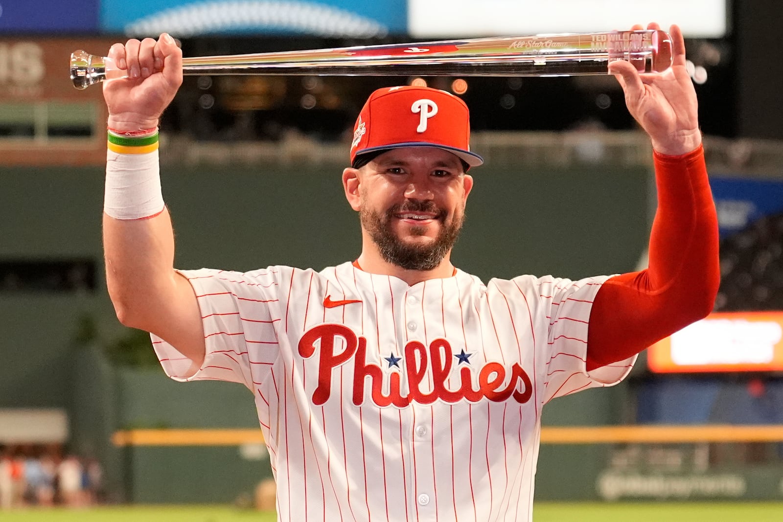 Philadelphia Phillies Kyle Schwarber celebrates after winning the tiebreaker at the MLB baseball All-Star game between the American League and National League, Tuesday, July 15, 2025, in Atlanta. (AP Photo/Brynn Anderson)