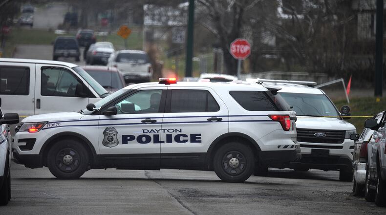 Dayton Police Department police cruisers. MARSHALL GORBY\STAFF