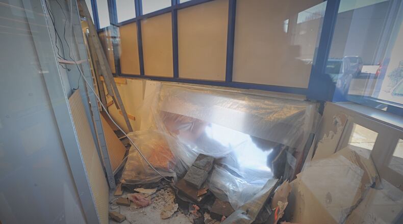 A car hit a Rite Aid on Linden Avenue in Dayton on Tuesday, Feb. 2, 2021. No injuries were reported. MARSHALL GORBY/STAFF