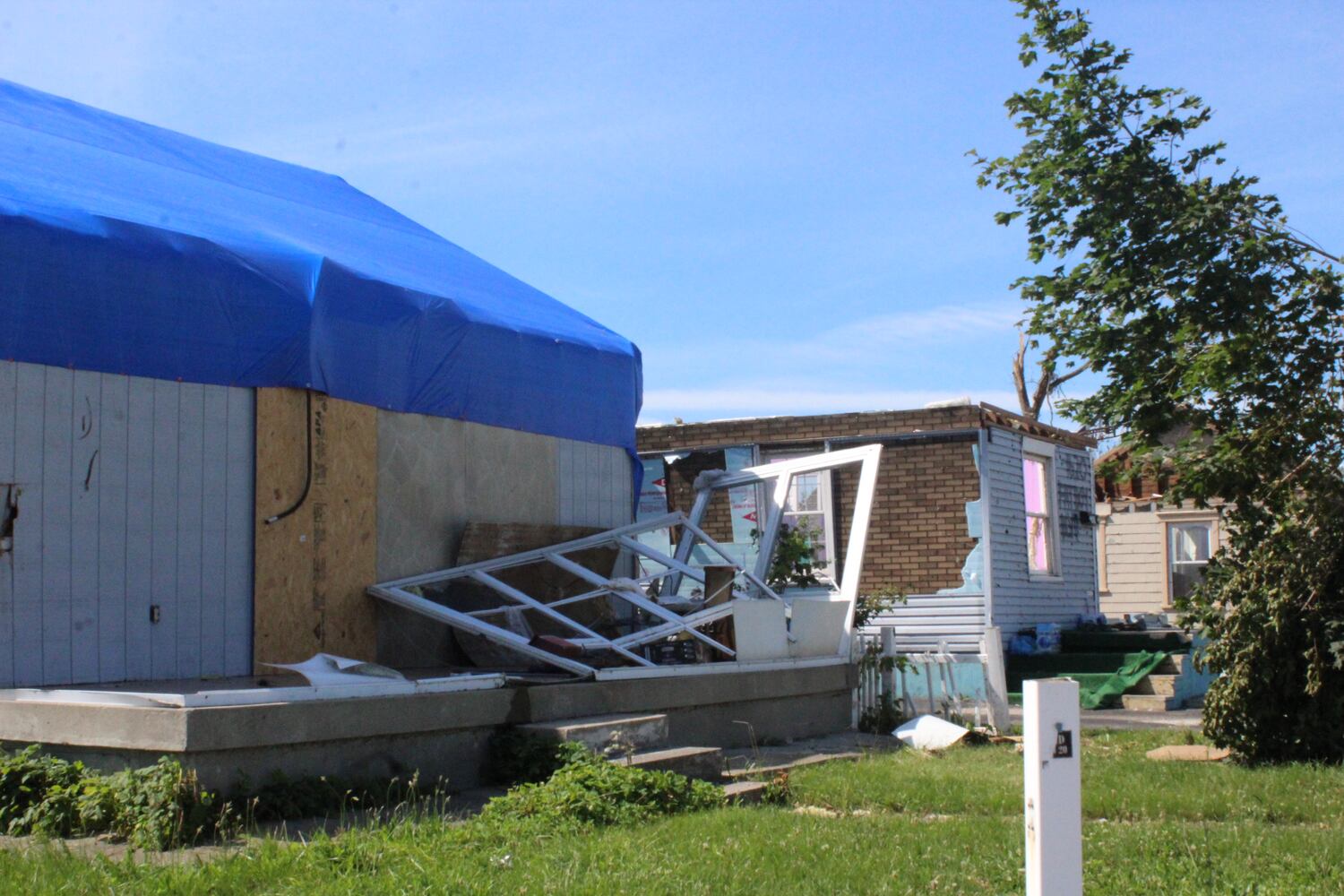 PHOTOS: Troy Street in Dayton two weeks after the Memorial Day tornadoes