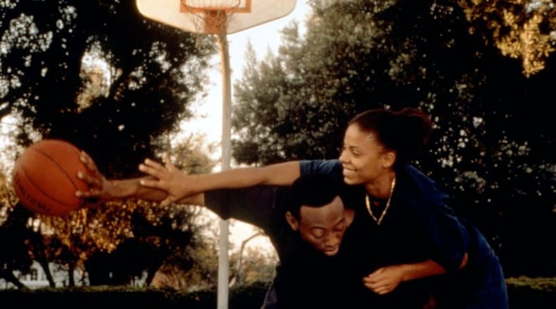 Omar Epps and Sanaa Lathan in "Love & Basketball," which will have a special 25th anniversary screening May 18 at The Neon as part of the second annual Dayton Black Women's Film Festival. NEW LINE CINEMA/EVERETT COLLECTION