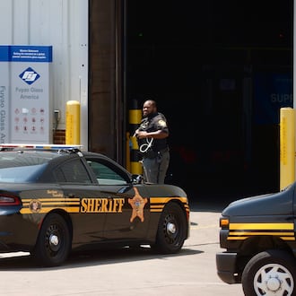 Several Montgomery County Sheriff's Office cruisers were staged outside Fuyao Glass America in Moraine Friday, July 26, 2024. FILE / STAFF