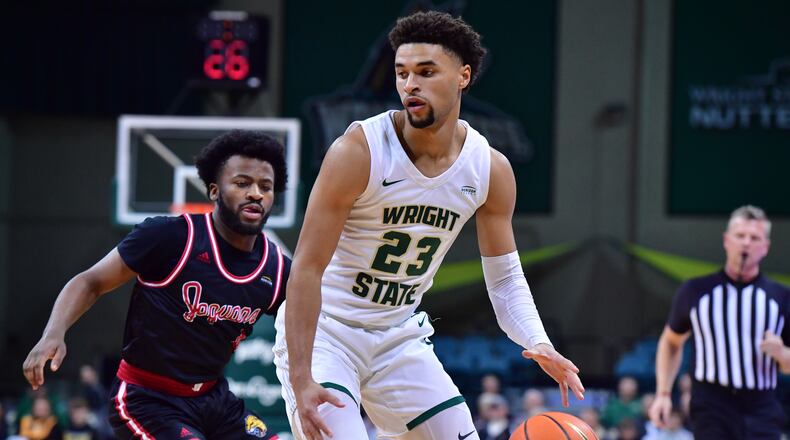 Wright State's Tanner Holden looks to score vs. IUPUI's Bryce Monroe during their game at the Nutter Center on Nov. 29, 2023. Wright State Athletics photo