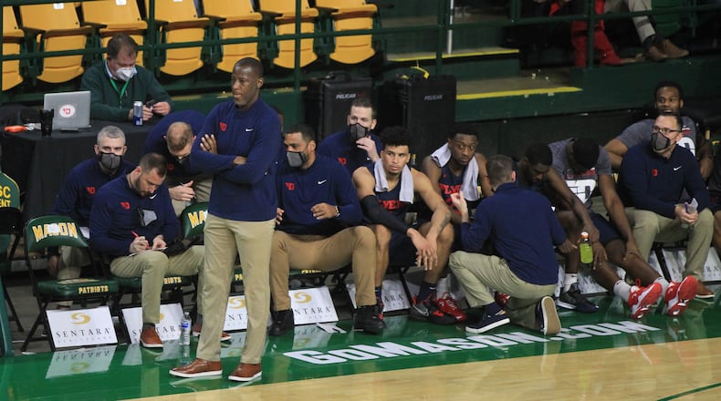 Dayton's Anthony Grant coaches during a game against George Mason on Saturday, Jan. 22, 2022, at EagleBank Arena in Fairfax, Va. David Jablonski/Staff