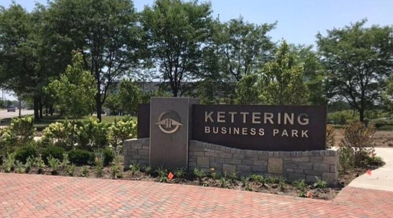 Kettering has approved money to help an e-retailer develop a property in the Kettering Business Park.