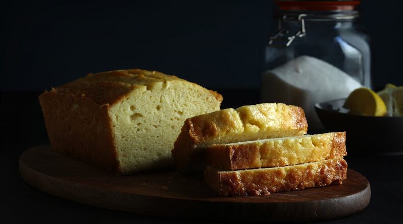 Lemon juice melted into granulated sugar forms a thin, shiny syrup that soaks into the loaf, bolstering its potency and imparting a glamorous gloss. (E. Jason Wambsgans/Chicago Tribune/TNS)