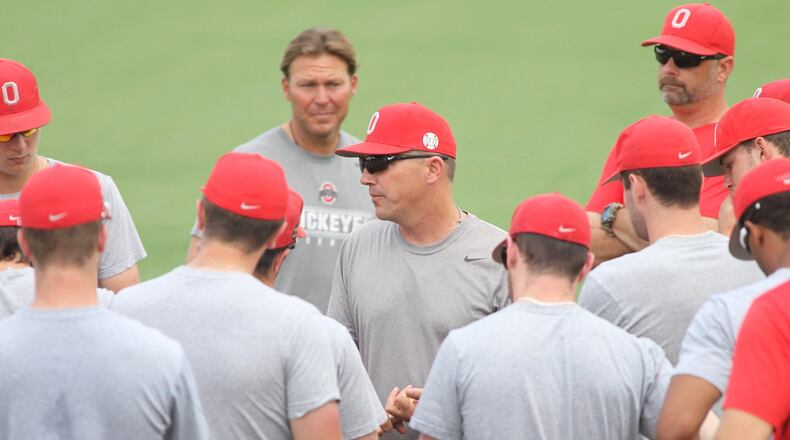 Ohio State baseball coach Greg Beals talks to his players during a practice on Tuesday, May 31, 2016, at Bill Davis Stadium in Columbus. David Jablonski/Staff