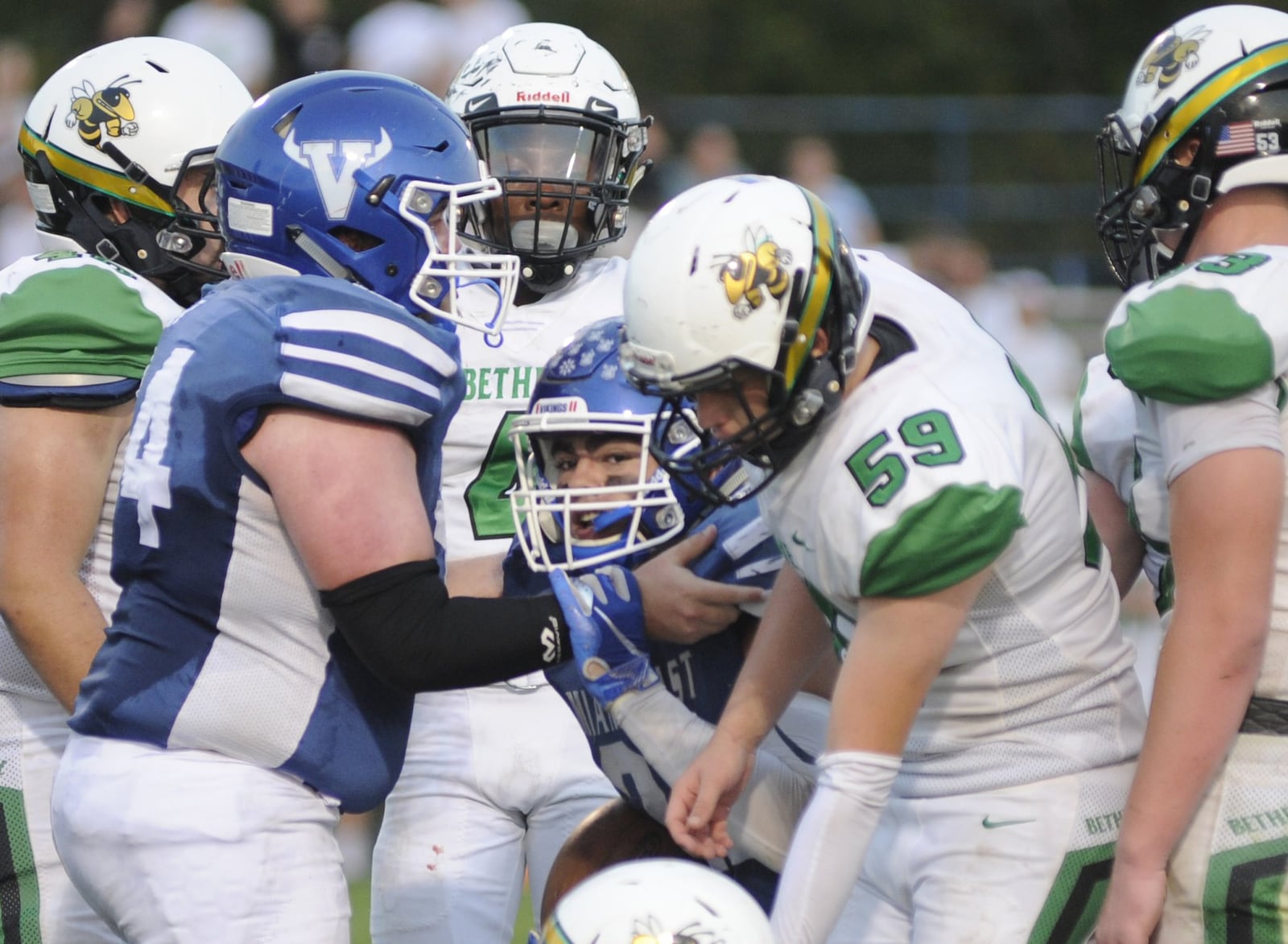 Miami East senior Vincent Villella (middle) ran for three touchdowns. Miami East defeated visiting Bethel 52-28 in a Week 5 high school football game on Thursday, Sept. 20, 2018. MARC PENDLETON / STAFF