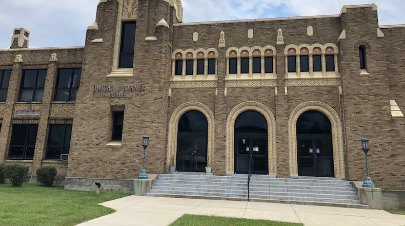 A Dayton organization has joined the effort urging Kettering schools to seek to preserve the 94-year-old D.L. Barnes, which the district plans to demolish the structure at 3750 Far Hills Avenue. Since its opening in 1929 it has served as the district’s high school, then as Dwight L. Barnes Junior High and now as home of Kettering’s school board and administrative offices. Those offices will move in 2019. JEREMY P. KELLEY / STAFF