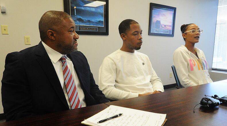 Local attorney Michael Wright with the parents of 3-year-old Braylen Tootle, his father Robert Tootle and mother Taneshia Lindsay at a press conference Wednesday, Sept. 13, 2023. MARSHALL GORB\STAFF