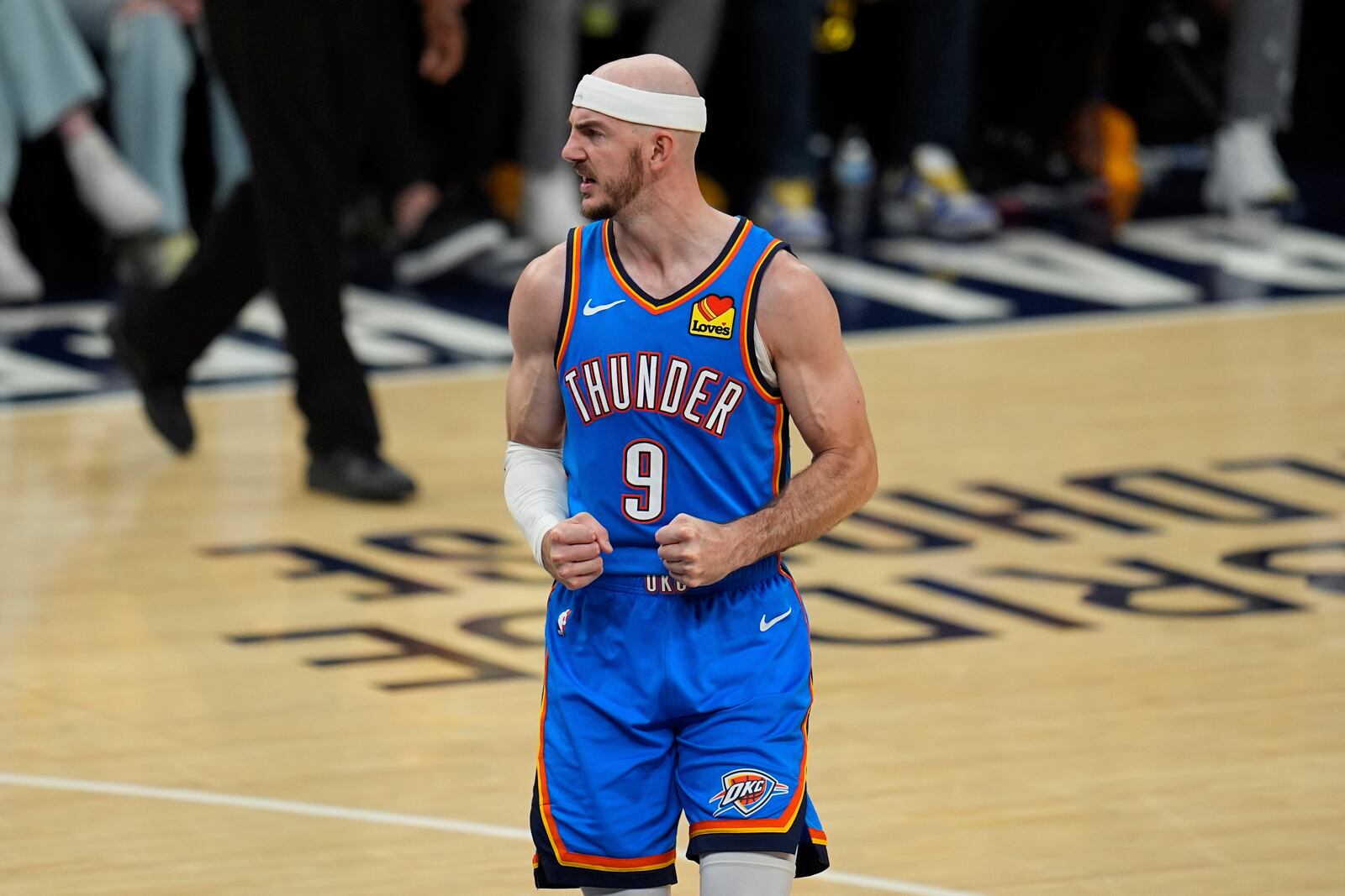 Oklahoma City Thunder guard Alex Caruso (9) celebrates during the second half of Game 4 of the NBA Finals basketball series against the Indiana Pacers, Friday, June 13, 2025, in Indianapolis. (AP Photo/Abbie Parr)