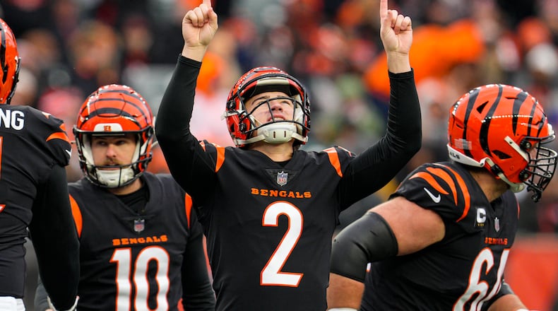 Cincinnati Bengals place kicker Evan McPherson (2) celebrates a field goal against the Cleveland Browns during the first half of an NFL football game in Cincinnati, Sunday, Jan. 7, 2024. (AP Photo/Jeff Dean)