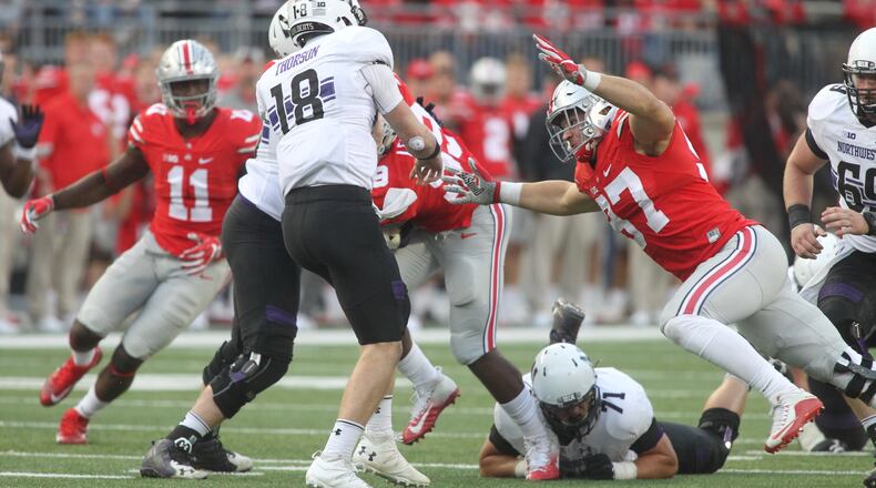 Ohio State’s Nick Bosa pressures Northwestern’s Clayton Thorson on Saturday, Oct. 29, 2016, at Ohio Stadium in Columbus. David Jablonski/Staff