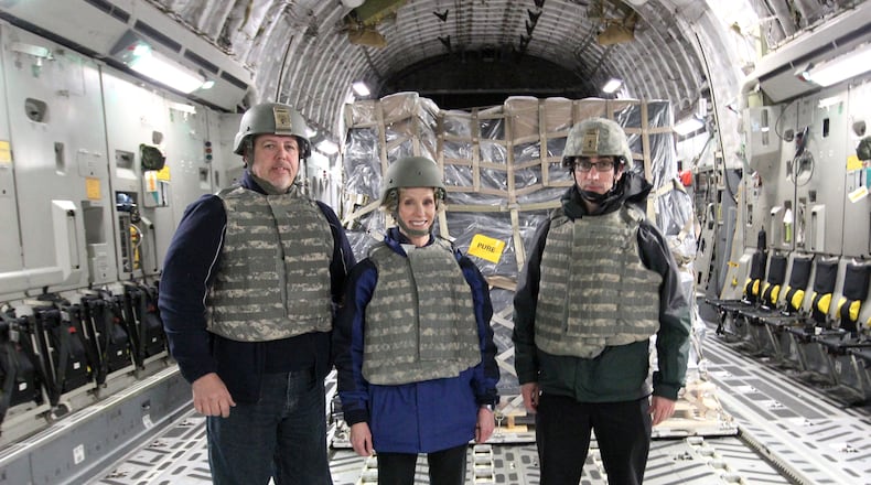 In 2015 Dayton Daily News reporter Barrie Barber (right), Newscenter 7 anchor Cheryl McHenry and Newscenter 7 videographer Bob Garlock went on a 12,000-mile journey with a crew from the 445 Airlift Wing at Wright-Patterson Air Force Base from the base, to Maryland, Germany and Afghanistan.