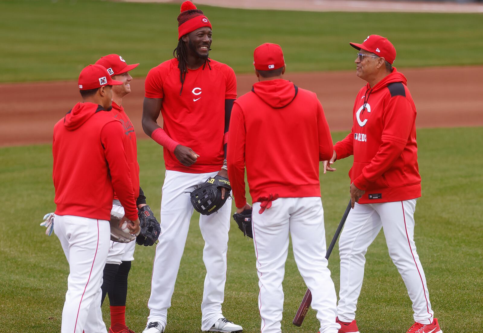 Cincinnati Reds players talk before for the Cincinnati Reds vs Top Prospects game at Day Air Ball Park, Tuesday, March 26, 2025. MARSHALL GORBY\STAFF