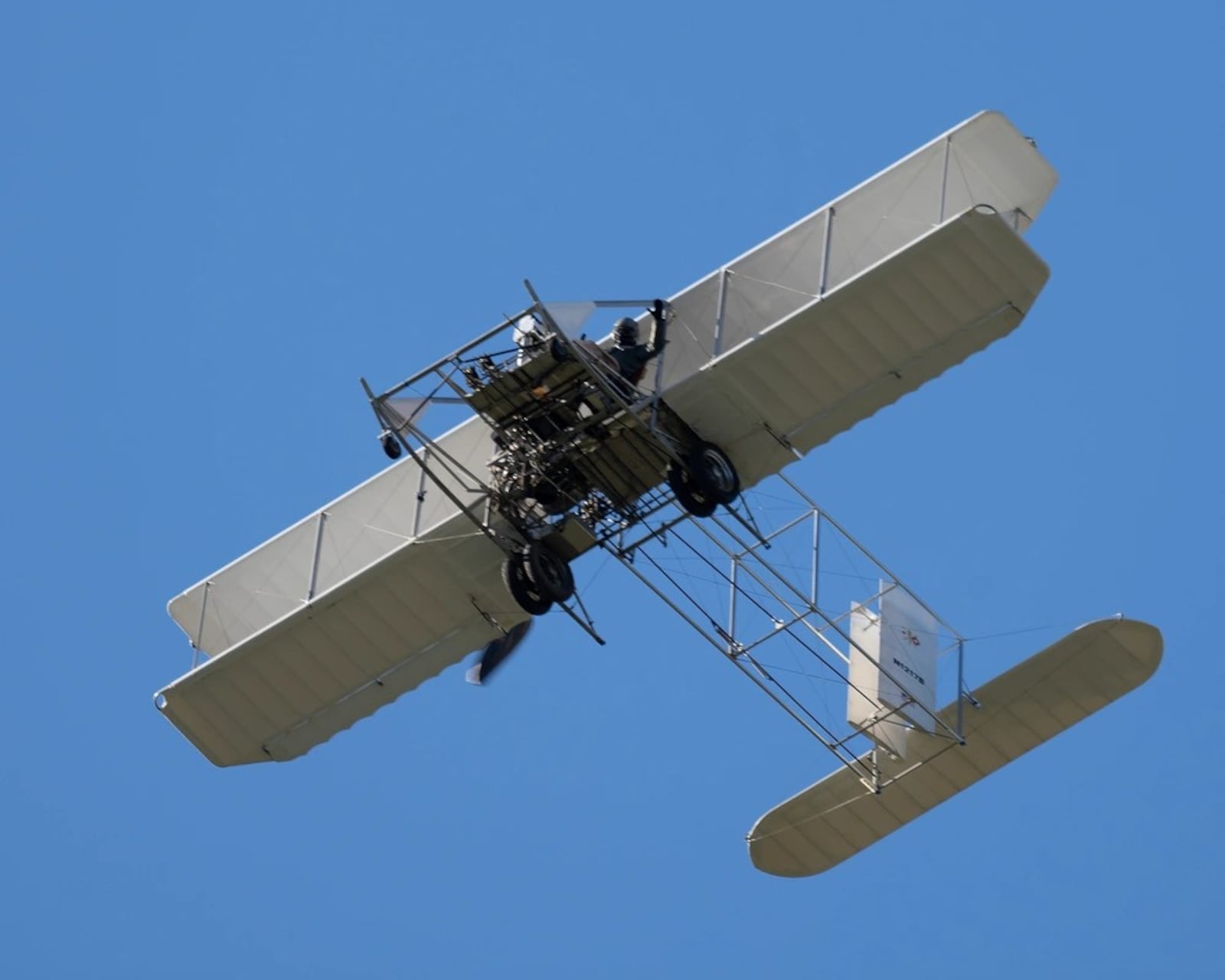 A "lookalike" of the Wright B Flyer does a flyby Oct 10, 2024, of a community reception at Wright-Patterson Air Force Base. The reception marked the 97th anniversary of Wright Field. (U.S. Air Force photo by R.J. Oriez)