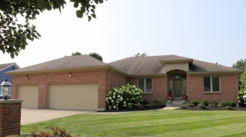 The half-acre property in Clearcreek Twp. has a concrete driveway that leads up to the three-car garage. Contributed photos by Kathy Tyler
