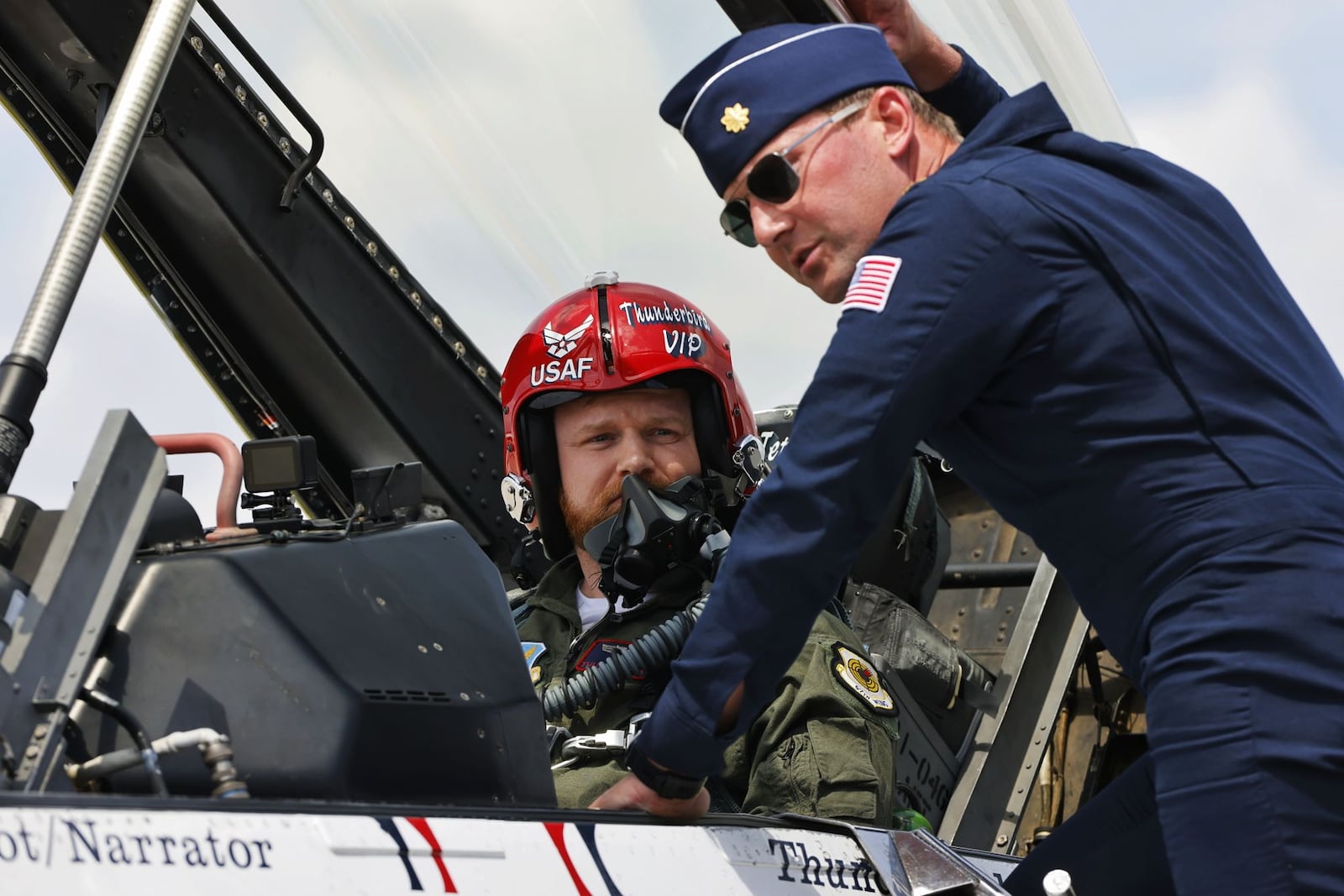 Tipp City police officer Jordan Little was honored by the United States Air Force Thunderbirds as a "Hometown Hero" and flew as a VIP in the back seat of an F-16 piloted by Maj. Brandon Maxson during a practice performance before the CenterPoint Energy Dayton Air Show Friday, June 20, 2025, in Vandalia. Little was recognized for his life-saving efforts of Justin Trevino, who was also in attendance. NICK GRAHAM/STAFF
