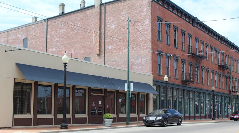 Wright Dunbar Inc. plans to convert the one-story vacant conference center at 1100 W. Third St. into a food hall and coffee bar. CORNELIUS FROLIK / STAFF