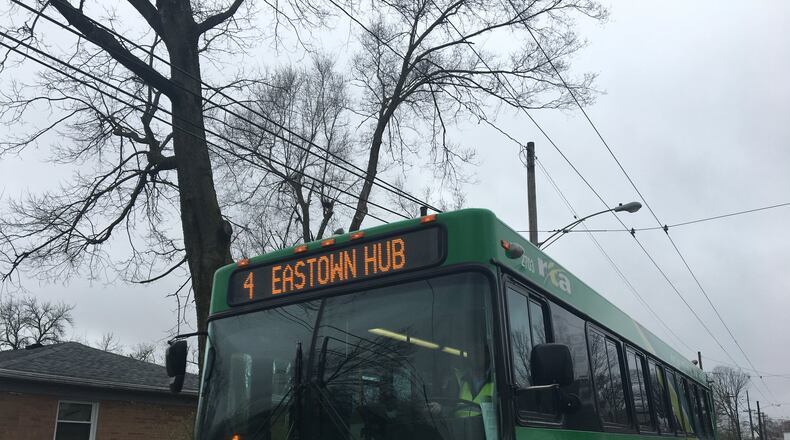A Greater Dayton RTA trolley bus travels down Kammer Avenue. A couple of residents have harshly criticized RTA’s placement of new trolley poles. CORNELIUS FROLIK / STAFF