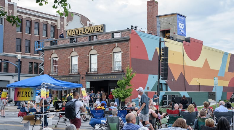 Come Together, a rooftop tribute to The Beatles, performed a free concert atop the historic Mayflower building facing downtown Troy’s Prouty Plaza in celebration of The Troy Foundation’s 100th anniversary on Saturday, June 8, 2024. The group features Dayton area musicians Patrick Himes, Brian Hoeflich, Kent Montgomery, Nathan Peters, Seth Gilliam and Brian Greaney. TOM GILLIAM / CONTRIBUTING PHOTOGRAPHER