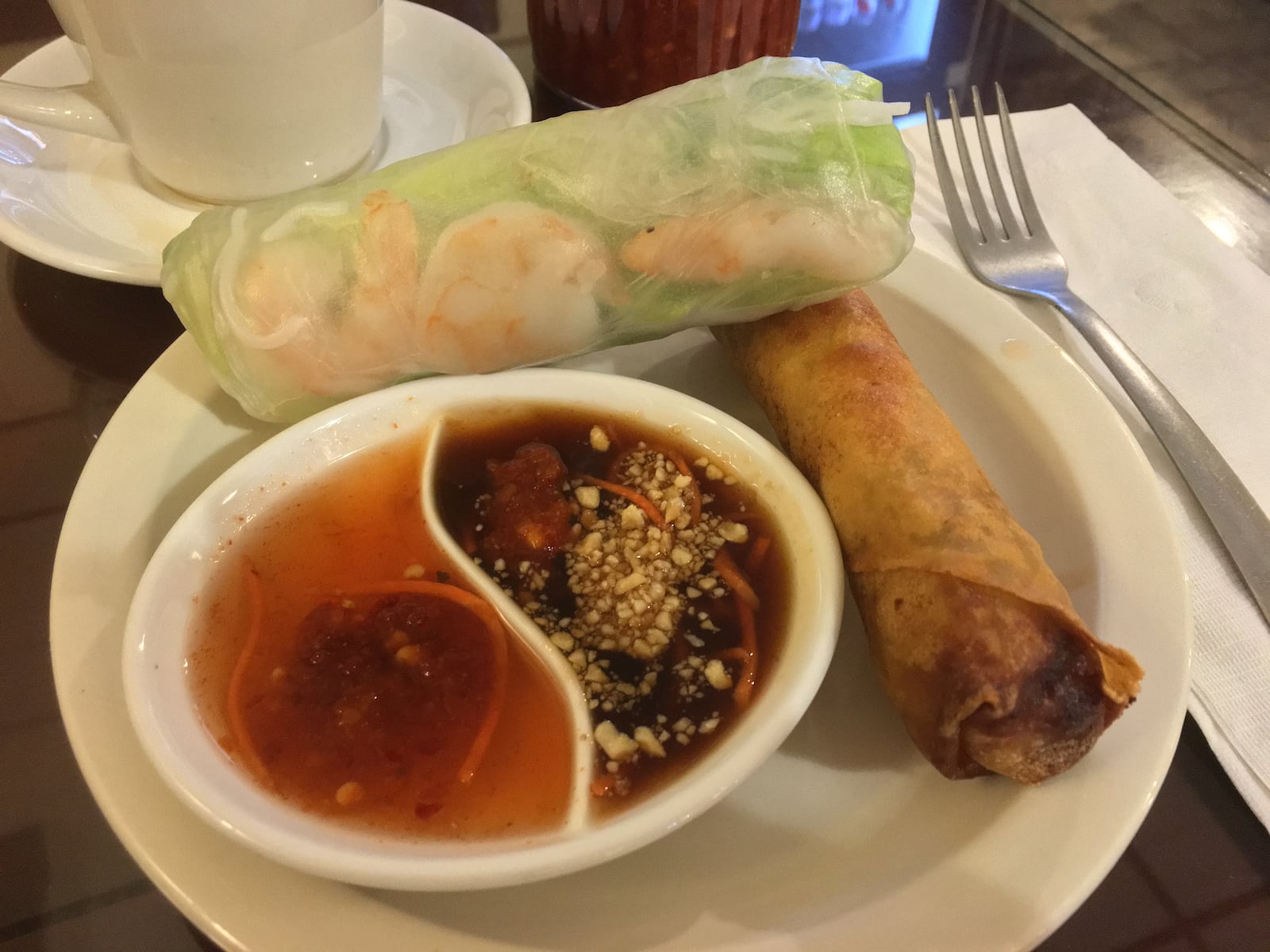 Little Saigon's soft spring roll and crispy egg roll with signature Little Saigon dipping sauces.