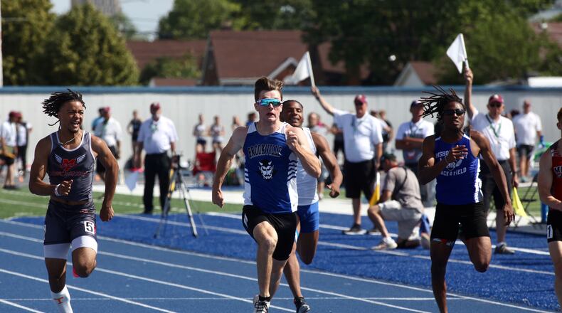 Brookville's Coy Hyre races to victory in the 100-meter dash in the OHSAA Division II state track and field championships on Saturday, June 1, 2024, at Welcome Stadium in Dayton. David Jablonski/Staff
