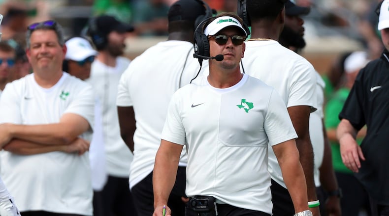 FILE - North Texas head coach Eric Morris walks the sideline during an NCAA college football game against Washington State, Sept. 13, 2025, in Denton, Texas. (AP Photo/Richard W. Rodriguez, file)