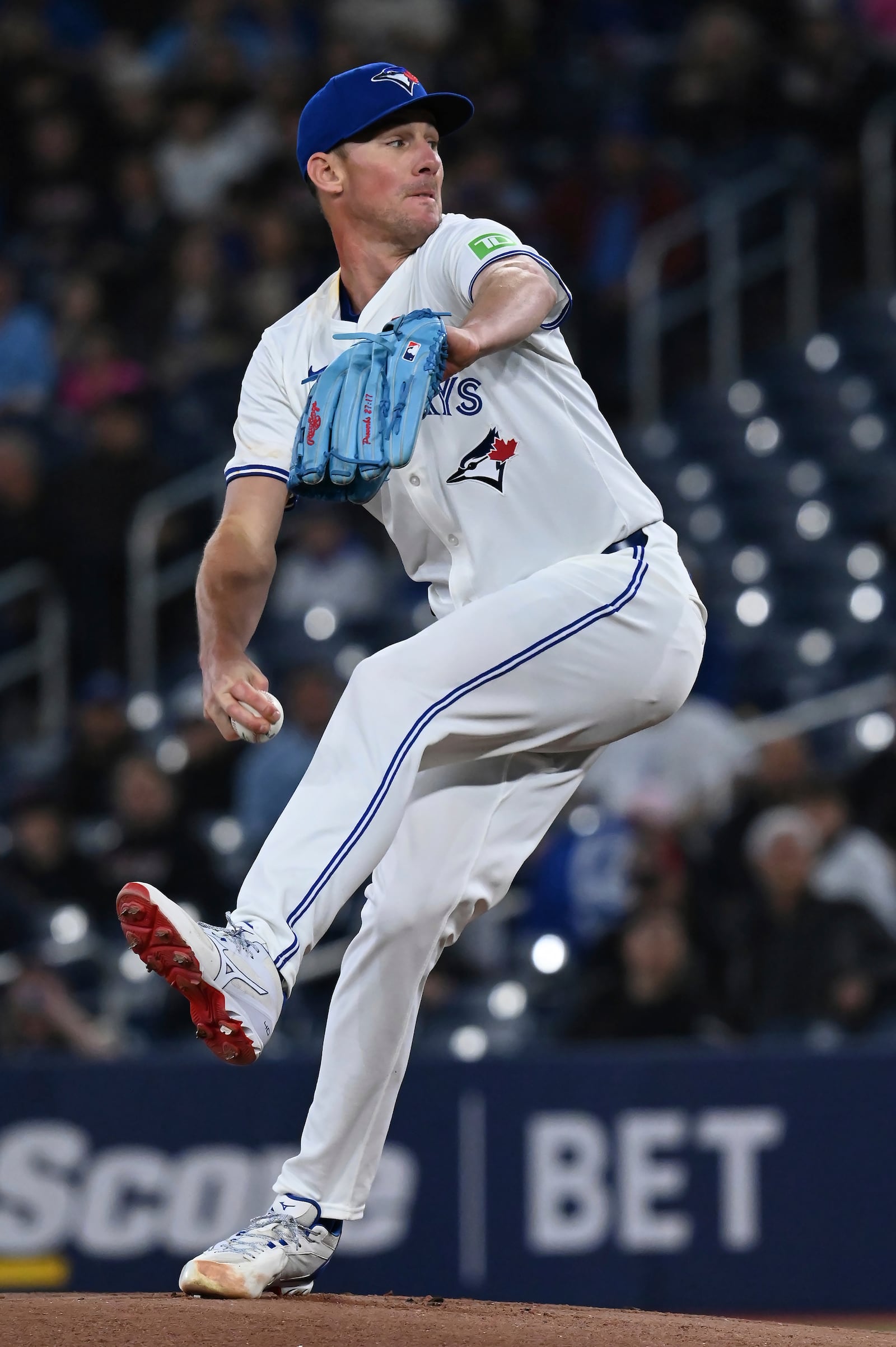 Toronto Blue Jays starting pitcher Chris Bassitt (40) throws to an Atlanta Braves batter in first inning baseball action in Toronto on Wednesday, April 16, 2025. (Jon Blacker/The Canadian Press via AP)
