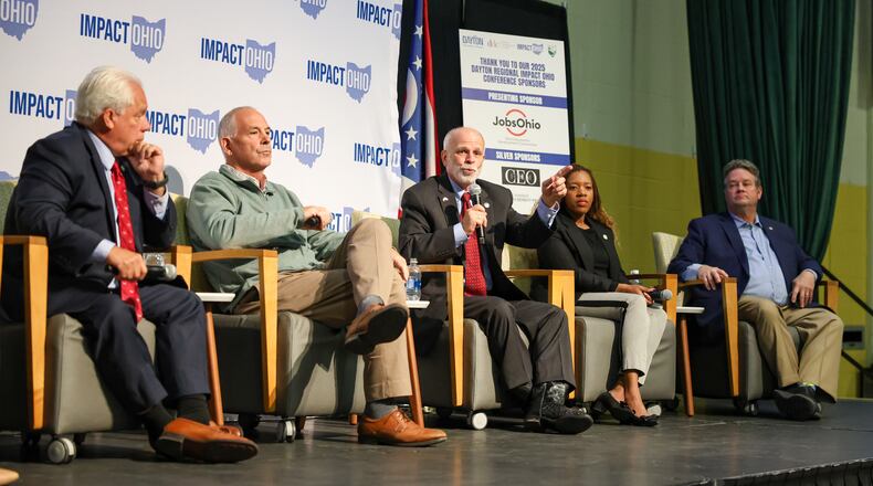 Ohio Sen. Kyle Koehler (R-Springfield) speaks while Rep. Phil Plummer (far left), Sen. Steve Huffman (center left), Rep. Desiree Tims (center right) and Rep. Brian Lampton (far right) during a panel in the Ohio Chamber's 2025 Dayton Regional Impact Ohio Conference on Tuesday, Aug. 26, in the Apollo Room in the Student Union at Wright State University. BRYANT BILLING / STAFF