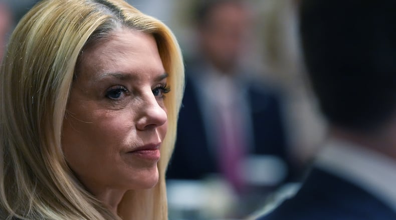 Attorney General Pam Bondi listens during a Cabinet meeting at the White House, Thursday, March 26, 2026, in Washington. (AP Photo/Alex Brandon)