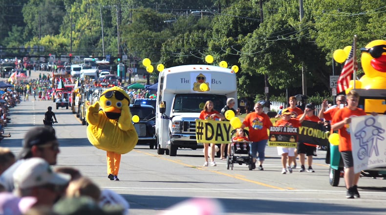 The annual Holiday at Home in Kettering featuring the circus theme  Under the Big Top  drew thousands of people to the streets on Monday, Sept. 3, 2018. The parade included units from civic groups, high school music programs, service organizations, car clubs and veterans from various branches of the military. CHUCK HAMLIN/STAFF