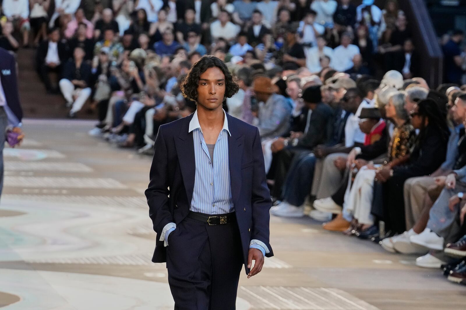 A model wears a creation as part of the men's Louis Vuitton Spring-Summer 2026 collection, that was presented in Paris, Tuesday, June 24, 2025. (AP Photo/Michel Euler)