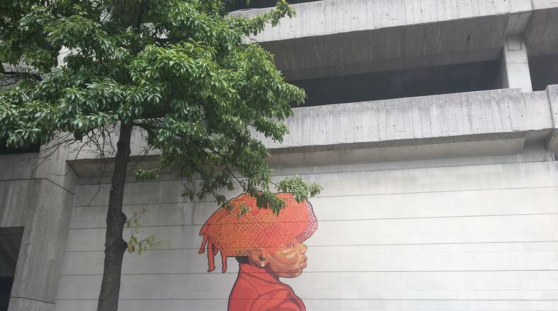 A mural on the south facing wall of the “beastly” transportation garage along East Fifth Street. CORNELIUS FROLIK / STAFF