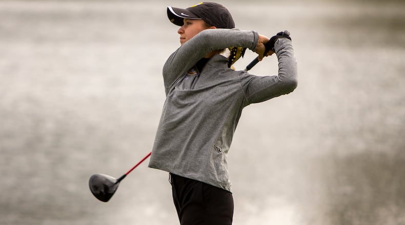 Centerville's Morgan Rodgers watches her tee shot during the final round of the Division I girls state golf tournament in Columbus last year. Jeff Gilbert/CONTRIBUTED