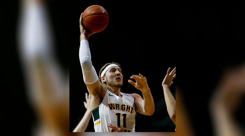 Wright State center Loudon Love scores two against Marshall during a mens basketball game at the Nutter Center in Fairborn Thursday, Dec. 3, 2020. In Sunday's win over Bowling Green, Love became the Raiders' all-time leading rebounder. E.L. Hubbard/CONTRIBUTED
