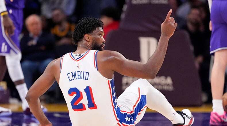 Philadelphia 76ers center Joel Embiid celebrates after scoring and drawing a foul during the second half of an NBA basketball game against the Los Angeles Lakers, Thursday, Feb. 5, 2026, in Los Angeles. (AP Photo/Mark J. Terrill)