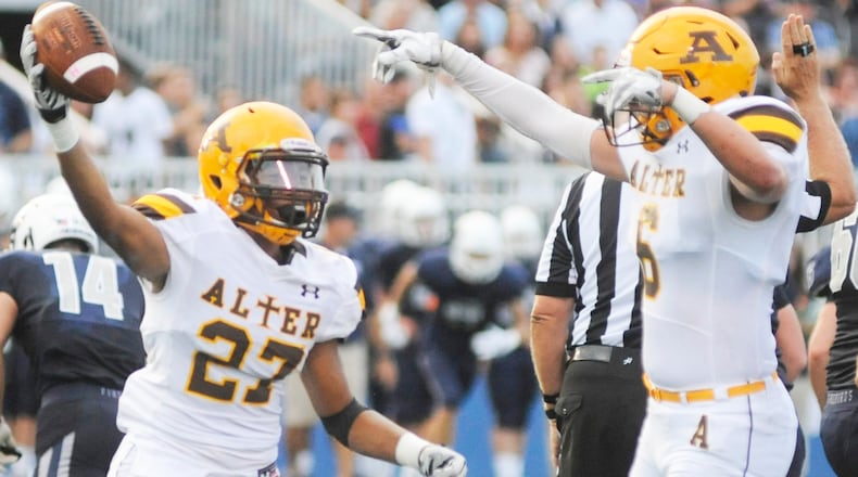 Alter's Antwann Martin Jr. (left) was named to the Division III first team All-Ohio defense. MARC PENDLETON / STAFF