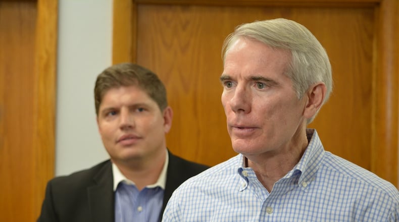 Senator Rob Portman visits Beavercreek, just over one month after the tornadoes. JIM OTTE/STAFF