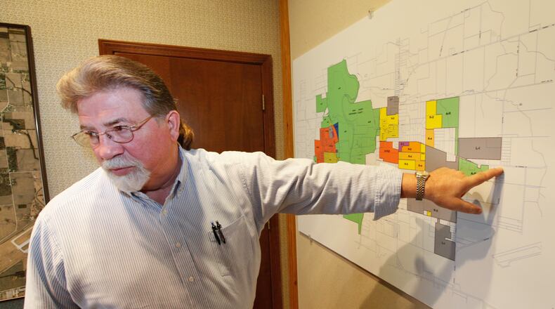 John Applegate, Union city manager, points out an area near Dayton International Airport the city annexed hoping to lure companies to a new City of Union Industrial Air Park. The city is currently seeking a $750,000 Montgomery County ED/GE grant for improvements. CHRIS STEWART / STAFF
