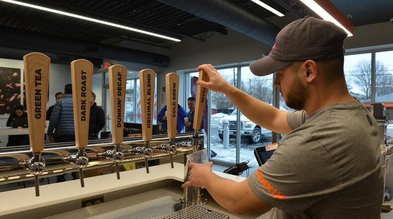 The new next-generation Dunkin' coffee shops are now pouring cold beverages through a tap system. CONTRIBUTED PHOTO